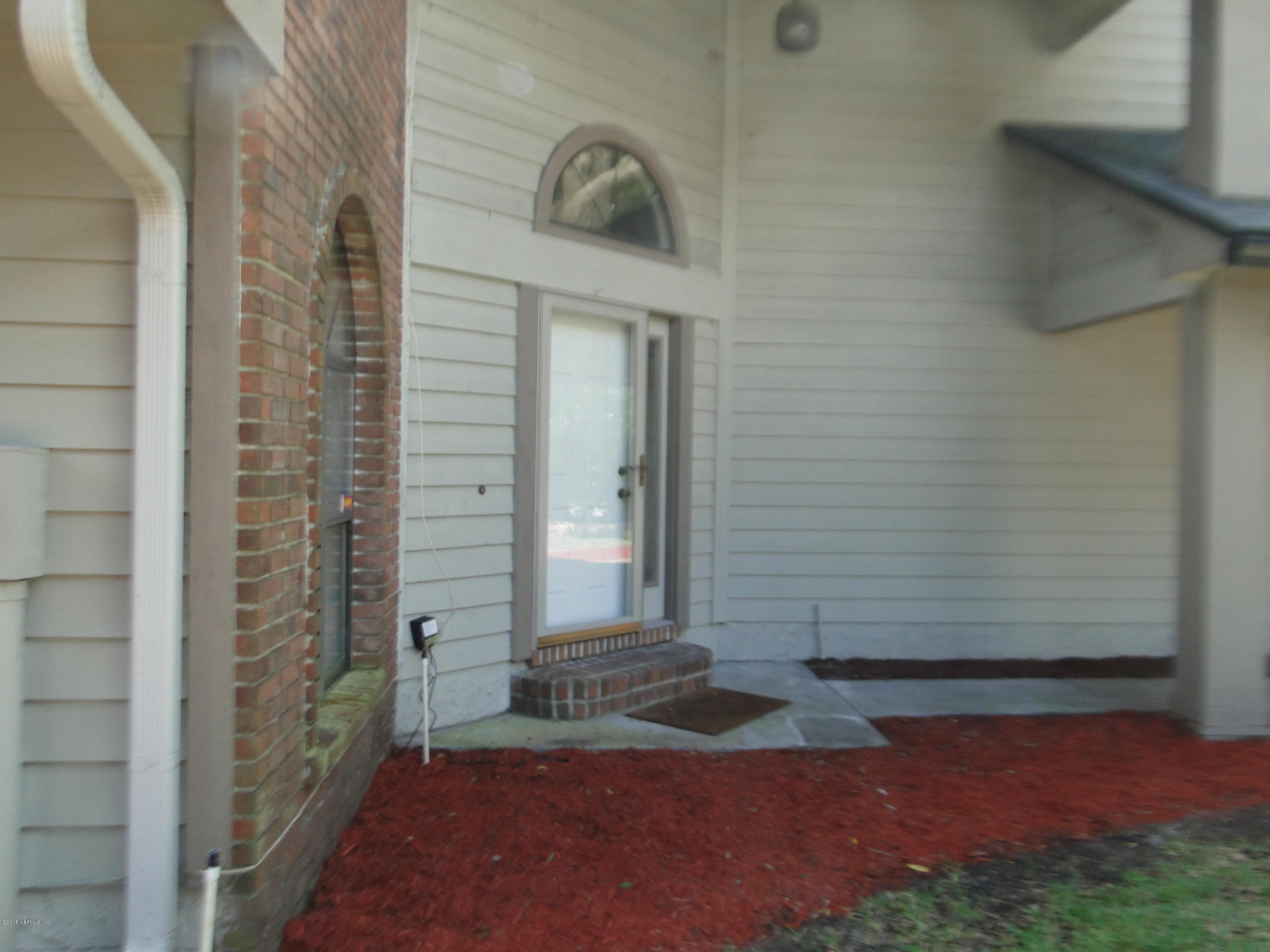 5496 Spring Brook Road Jacksonville, FL 32277 - Photo 2 of 25 a view of outdoor space and yard