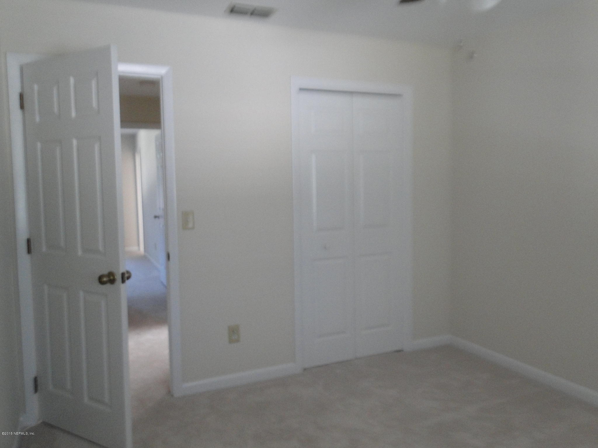 5496 Spring Brook Road Jacksonville, FL 32277 - Photo 25 of 25 wooden floor in an empty room