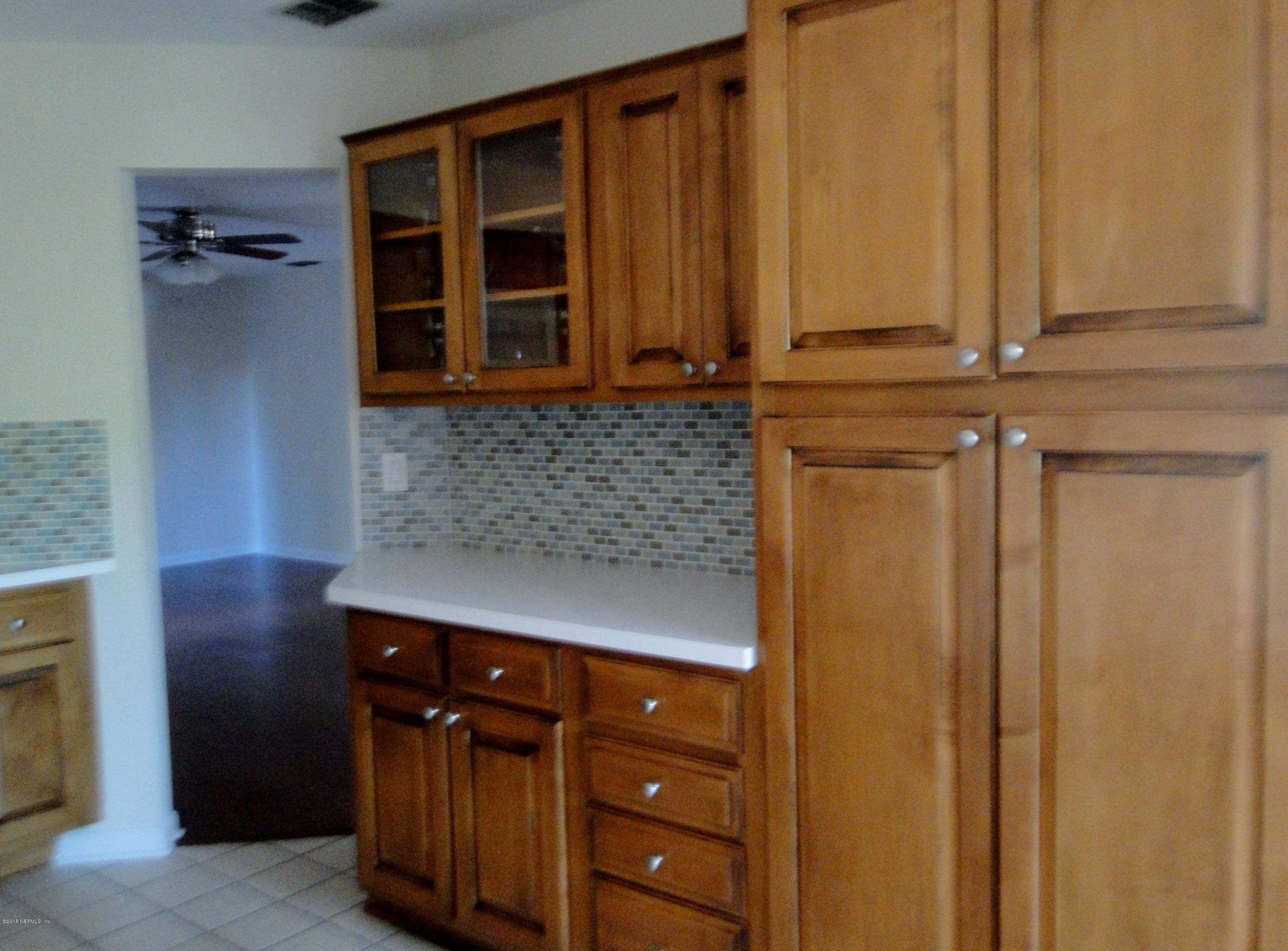 5496 Spring Brook Road Jacksonville, FL 32277 - Photo 8 of 25 a view of walk in closet