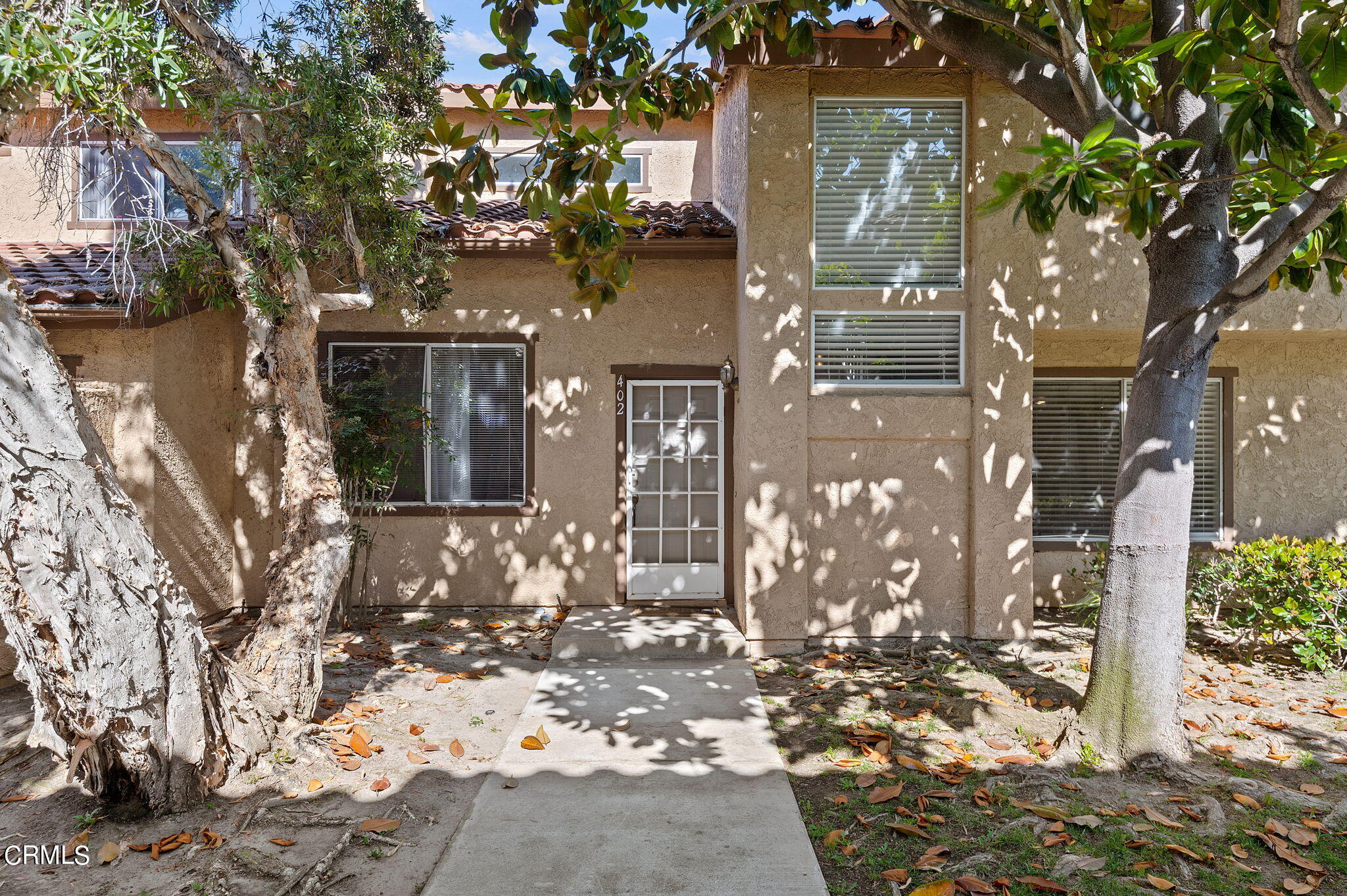 402 Johnson Road Oxnard, CA 93033 - Photo 2 of 18 a view of a house with a tree