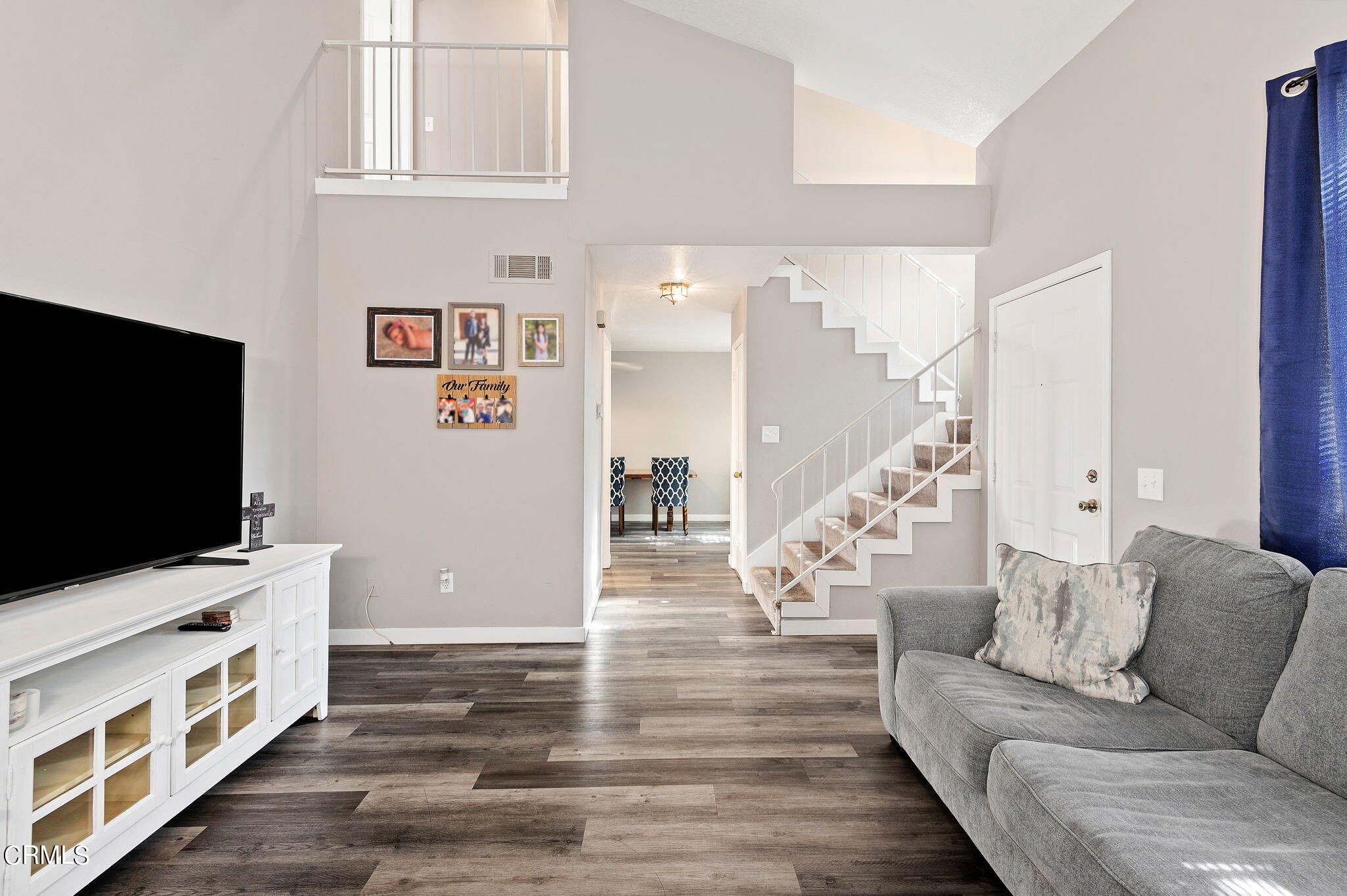 402 Johnson Road Oxnard, CA 93033 - Photo 5 of 18 a living room with furniture and a flat screen tv