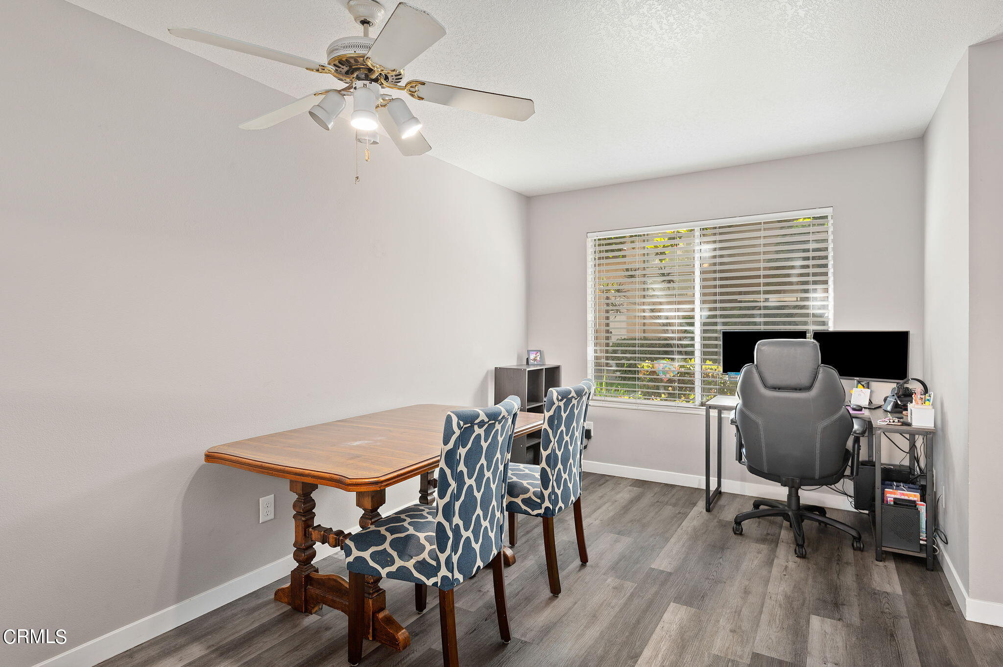 402 Johnson Road Oxnard, CA 93033 - Photo 7 of 18 a view of a dining room with furniture window and wooden floor