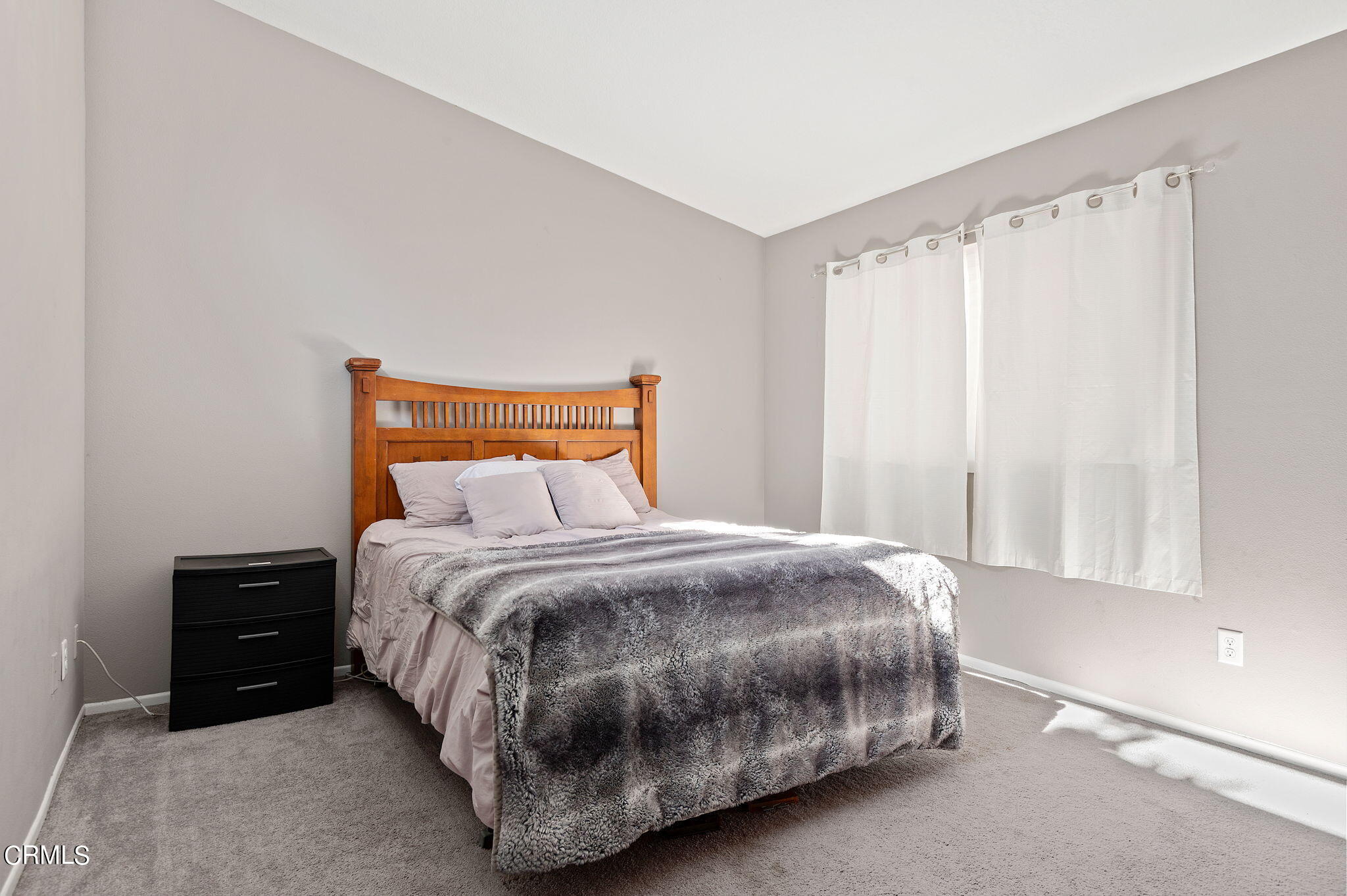 402 Johnson Road Oxnard, CA 93033 - Photo 10 of 18 a bedroom with a bed and a window