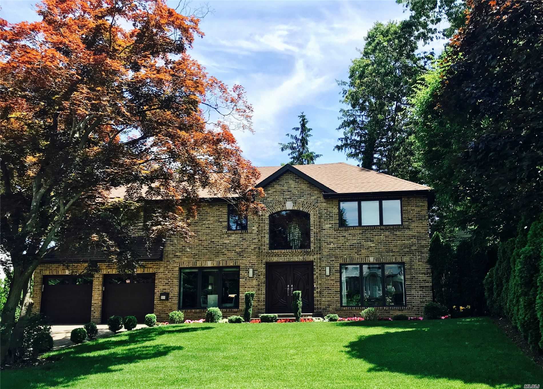 86 Pickwick Road Manhasset, NY 11030 - Photo 1 of 1 a view of a yard in front of a house