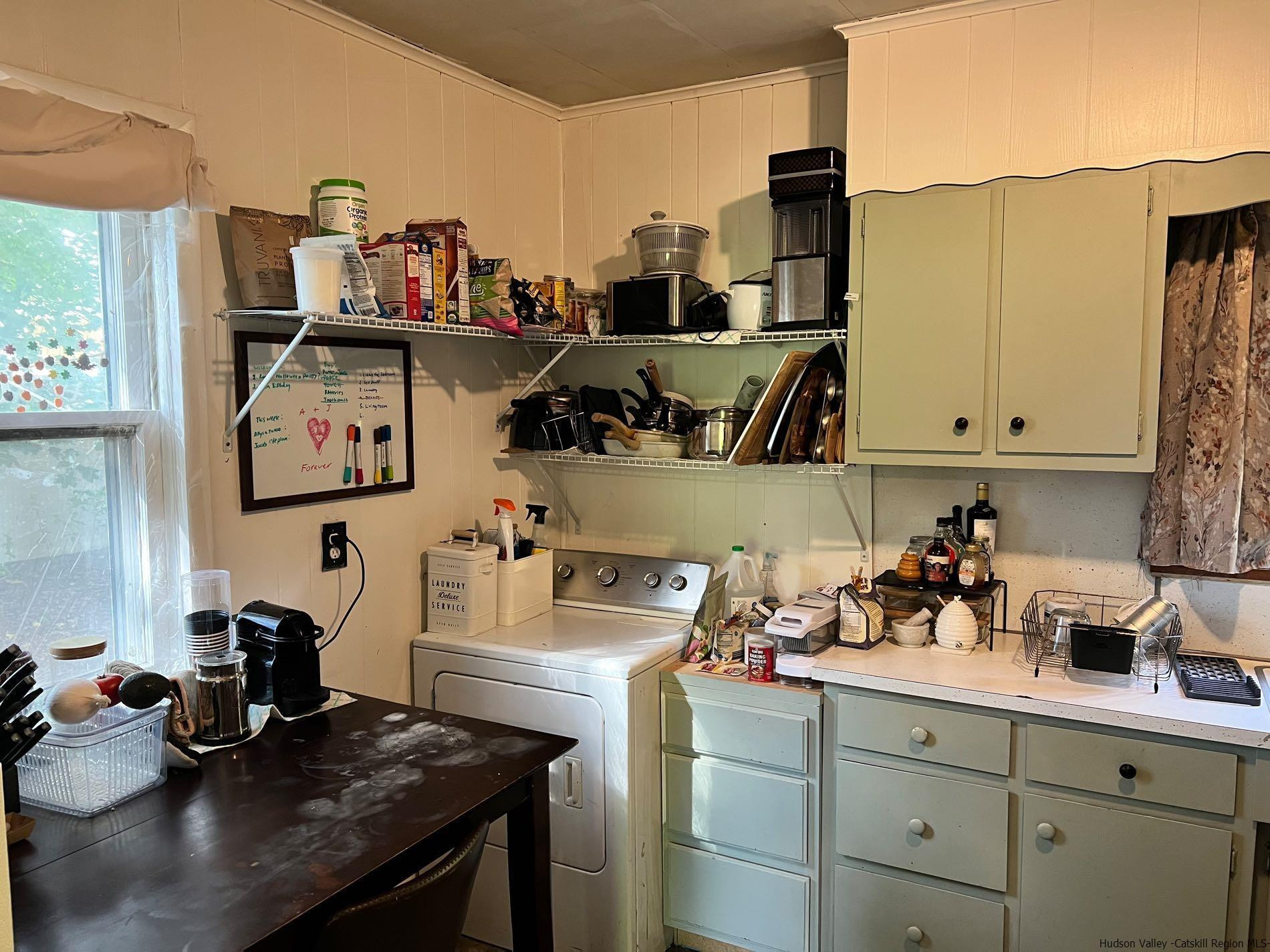 87 Dewitt Street Kingston, NY 12401 - Photo 17 of 33 a kitchen with a sink and cabinets