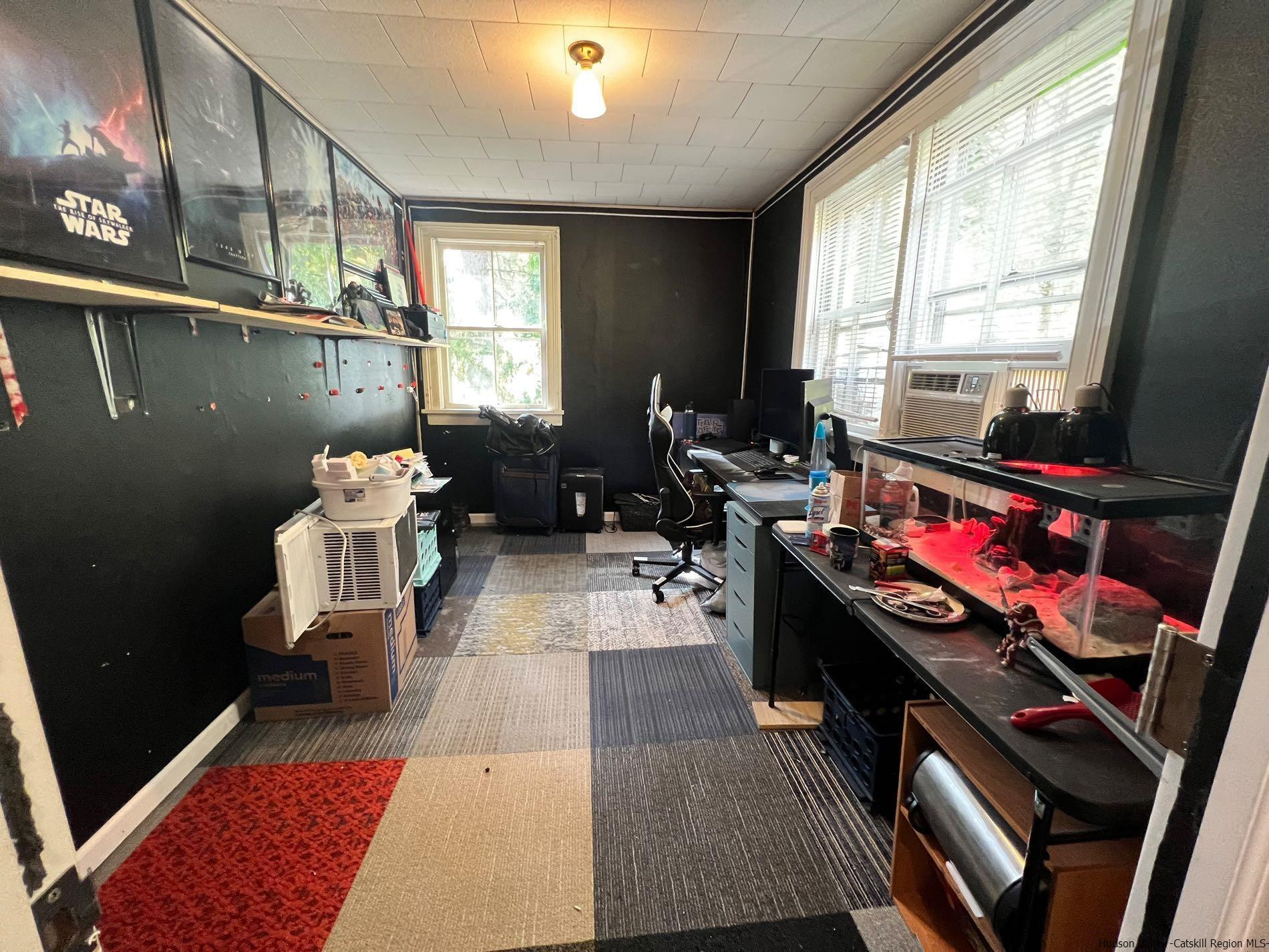 87 Dewitt Street Kingston, NY 12401 - Photo 31 of 33 a kitchen with furniture a rug appliances and a window