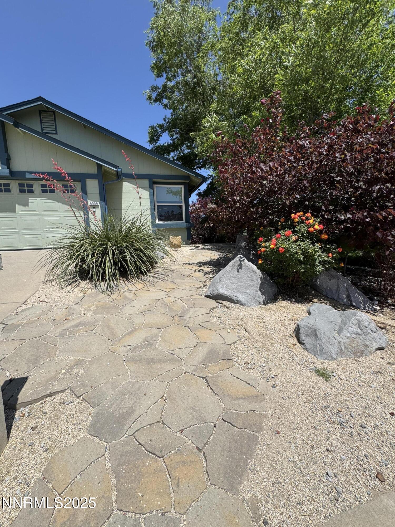 6559 Fall River Circle Reno, NV 89523 - Photo 2 of 35 a view of a backyard of a house
