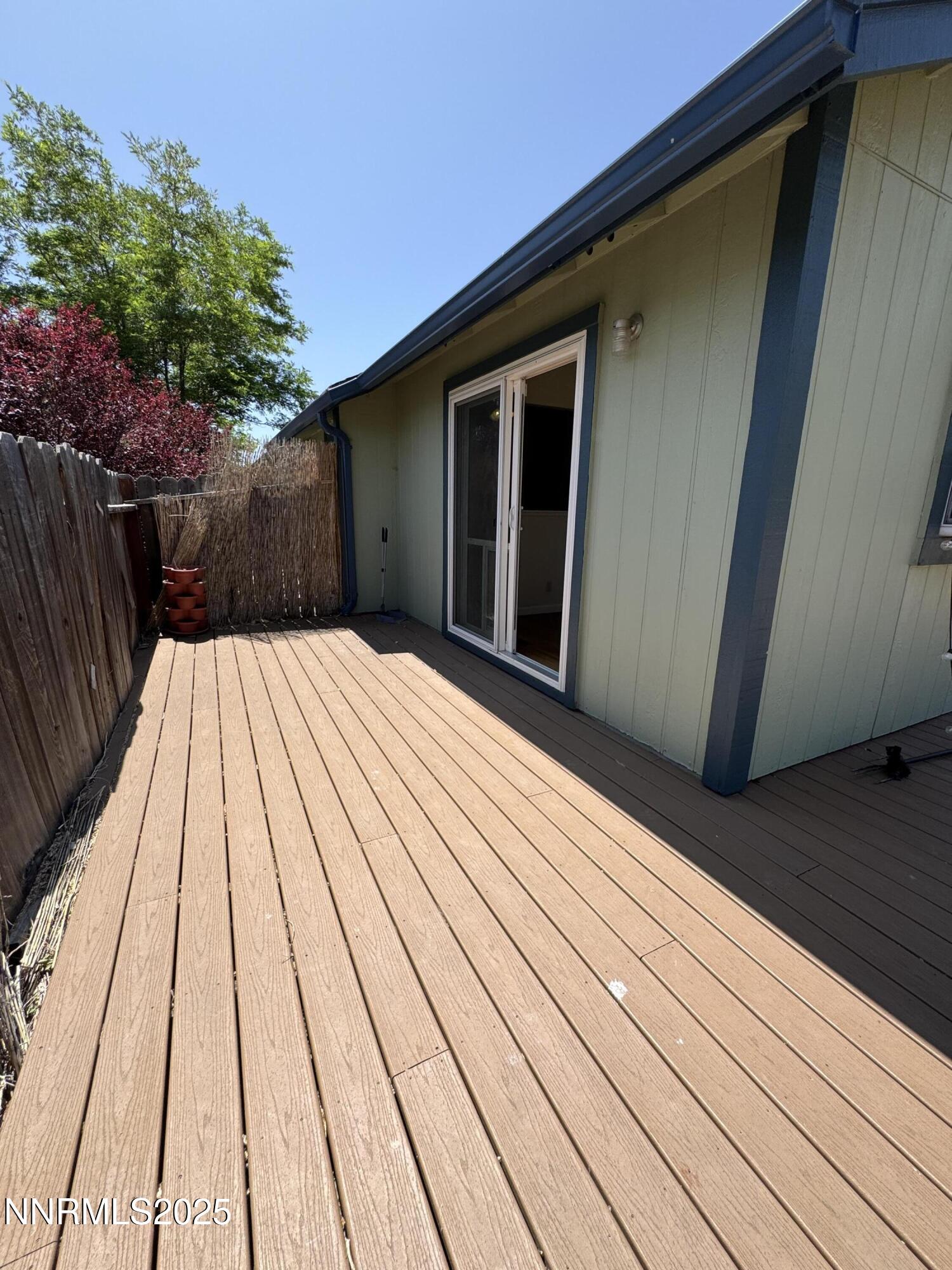 6559 Fall River Circle Reno, NV 89523 - Photo 8 of 35 a view of balcony with wooden floor and fence