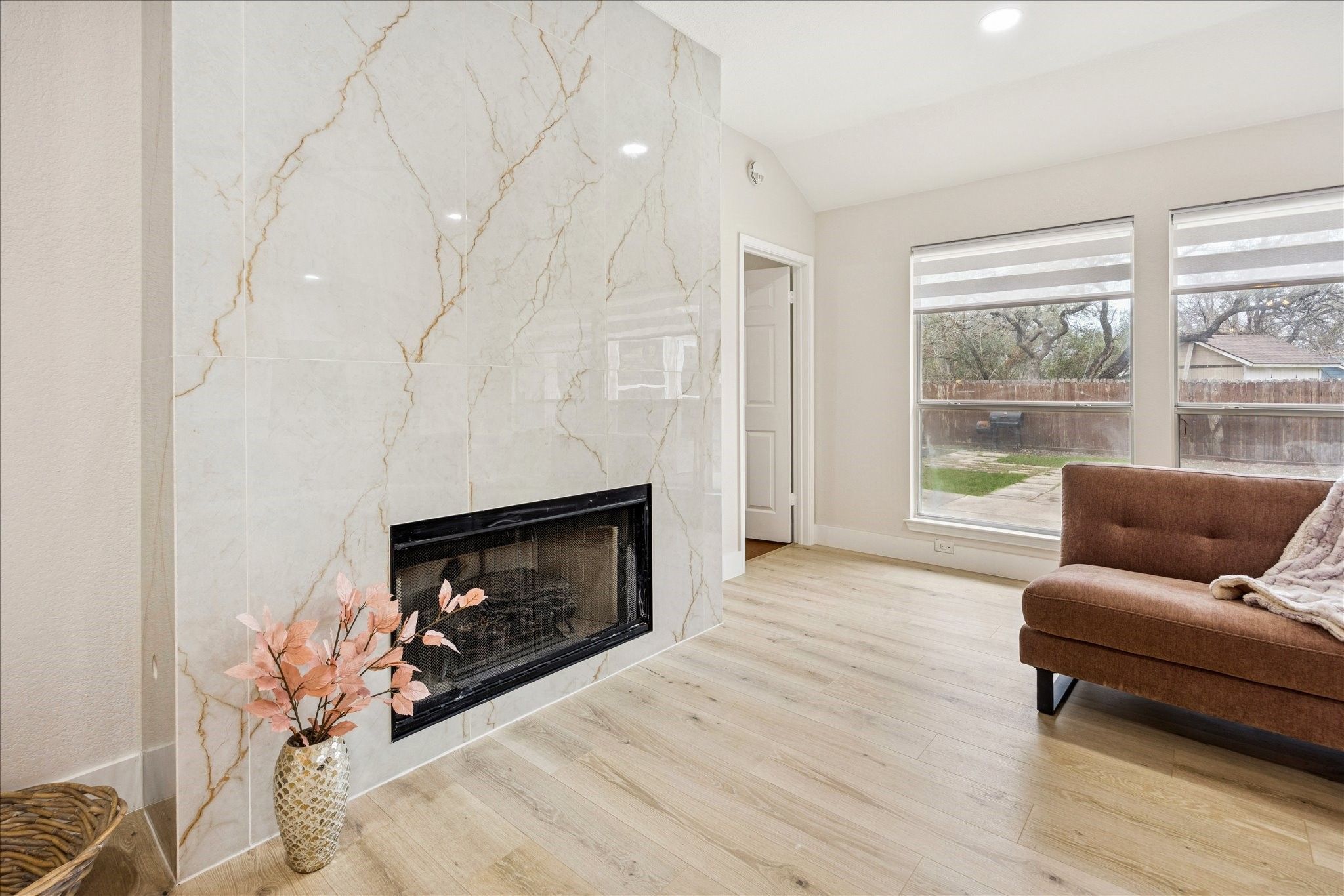 12624 Twisted Briar Lane Austin, TX 78729 - Photo 13 of 41 a living room with furniture and a fireplace