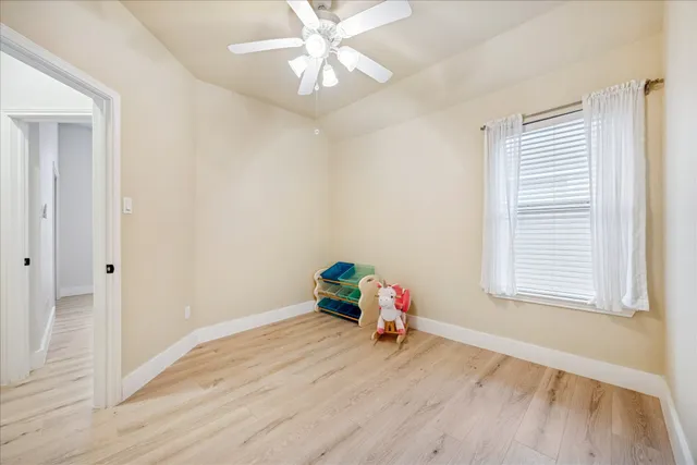 a room with toys and wooden floor