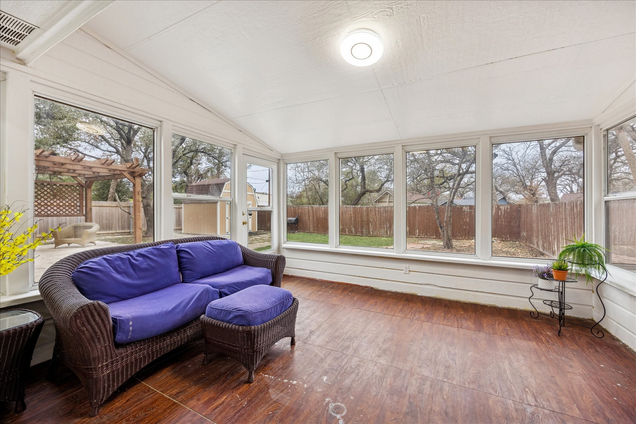 12624 Twisted Briar Lane Austin, TX 78729 - Photo 34 of 41 a living room with furniture and a large window