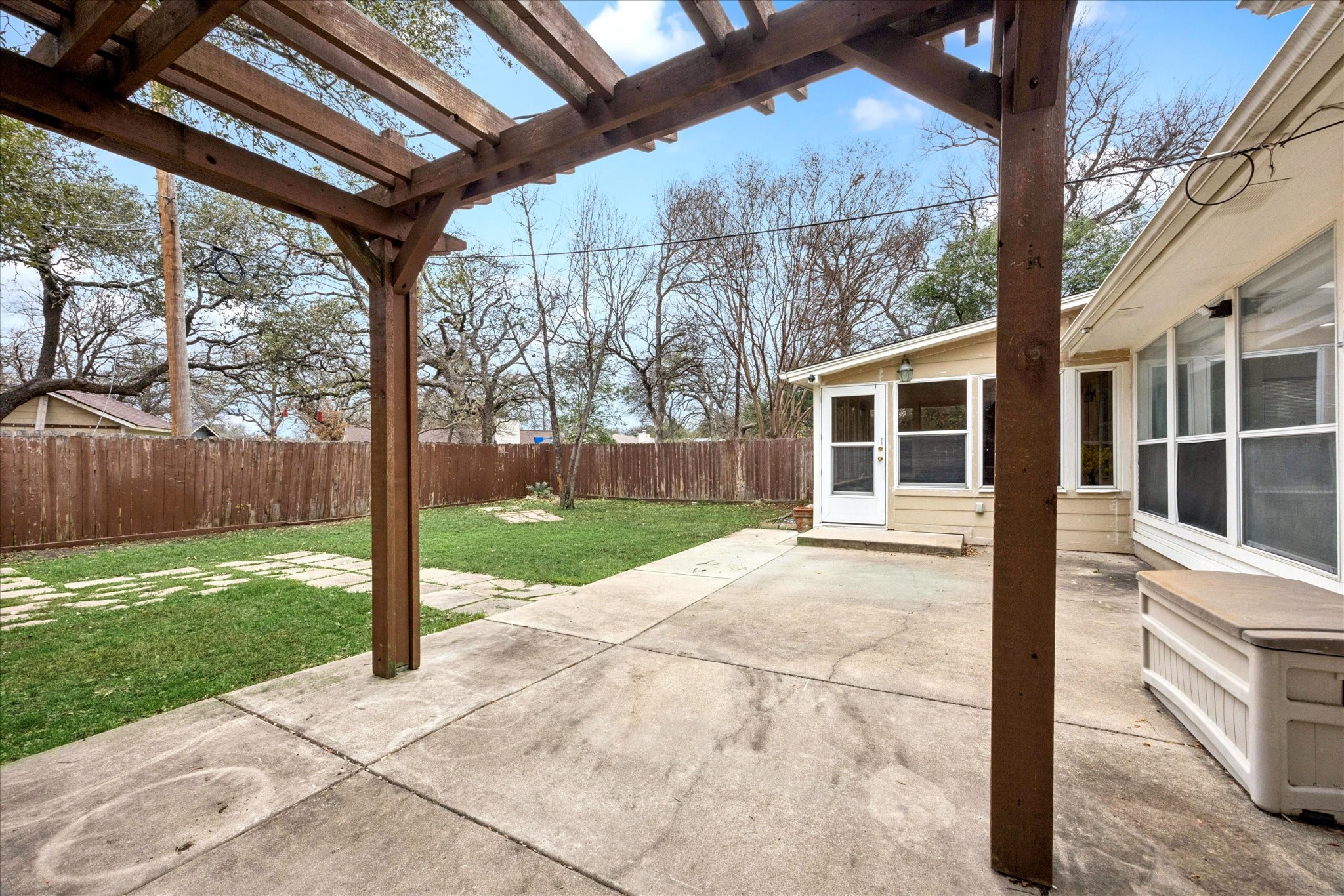 12624 Twisted Briar Lane Austin, TX 78729 - Photo 37 of 41 a view of a house with backyard and a tree