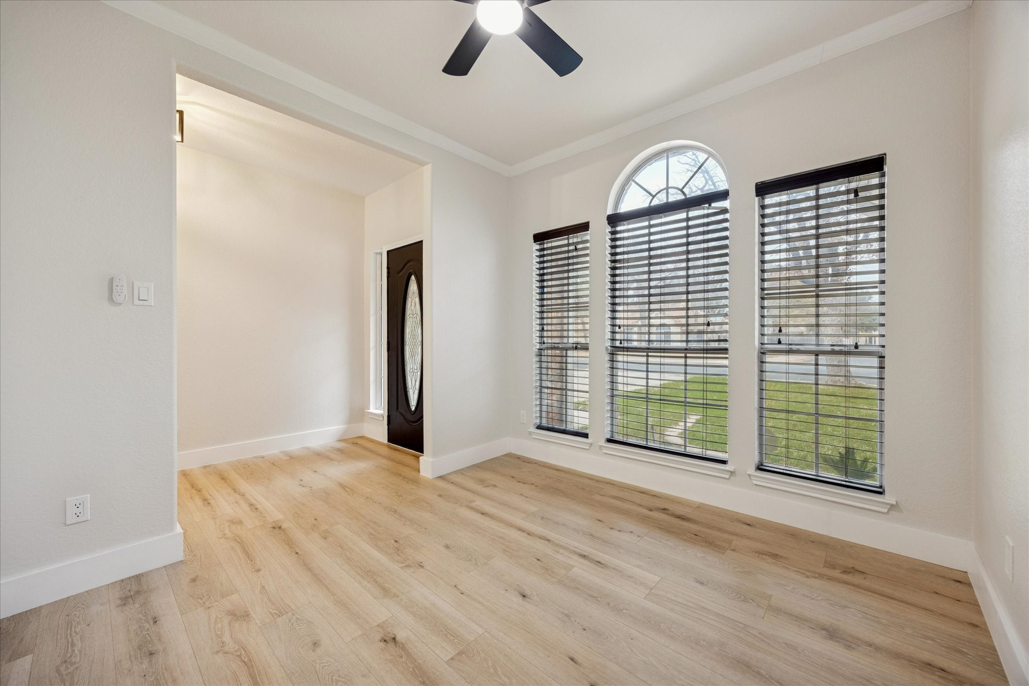 12624 Twisted Briar Lane Austin, TX 78729 - Photo 5 of 41 an empty room with windows