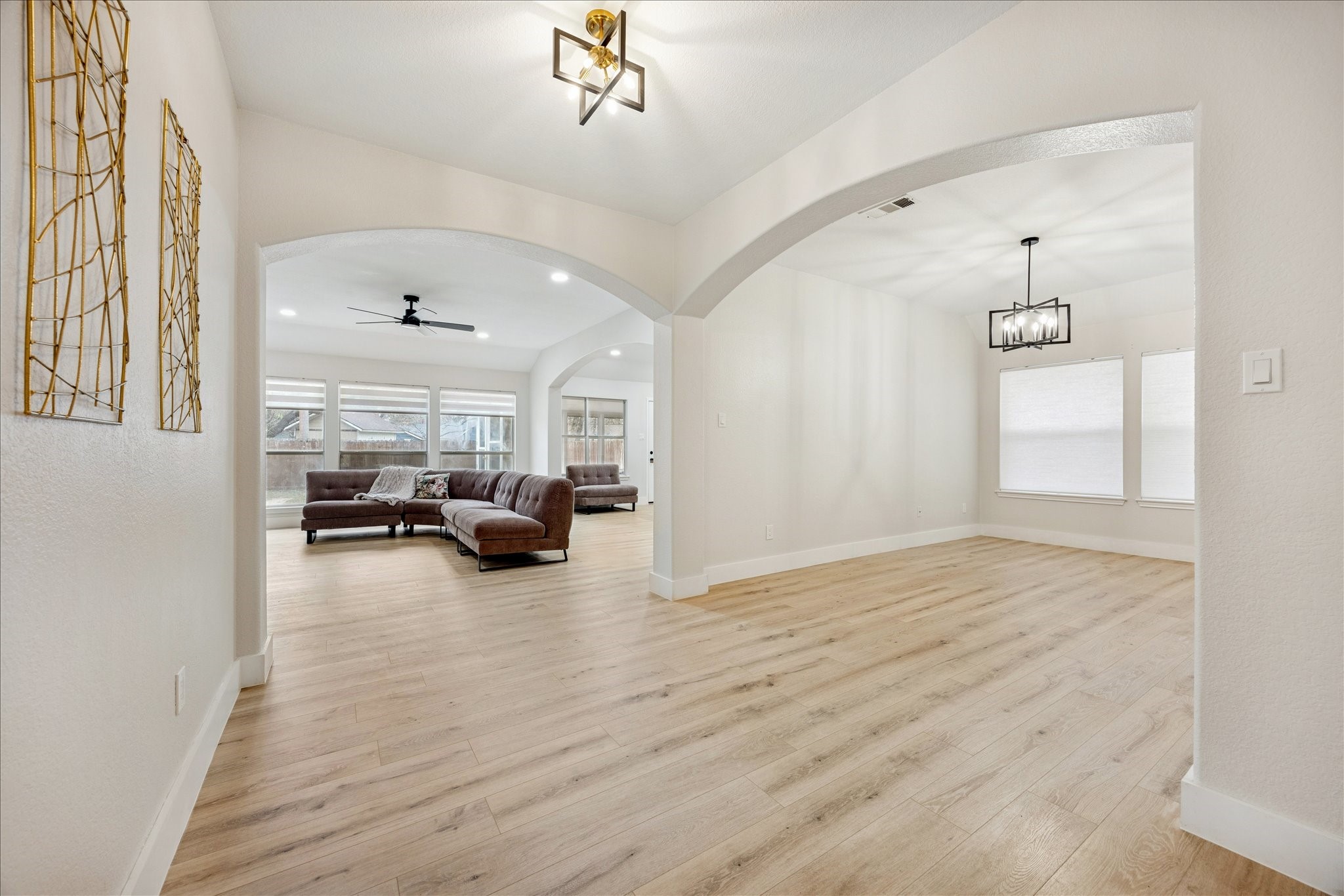 12624 Twisted Briar Lane Austin, TX 78729 - Photo 7 of 41 a view of a livingroom with furniture a ceiling fan and window