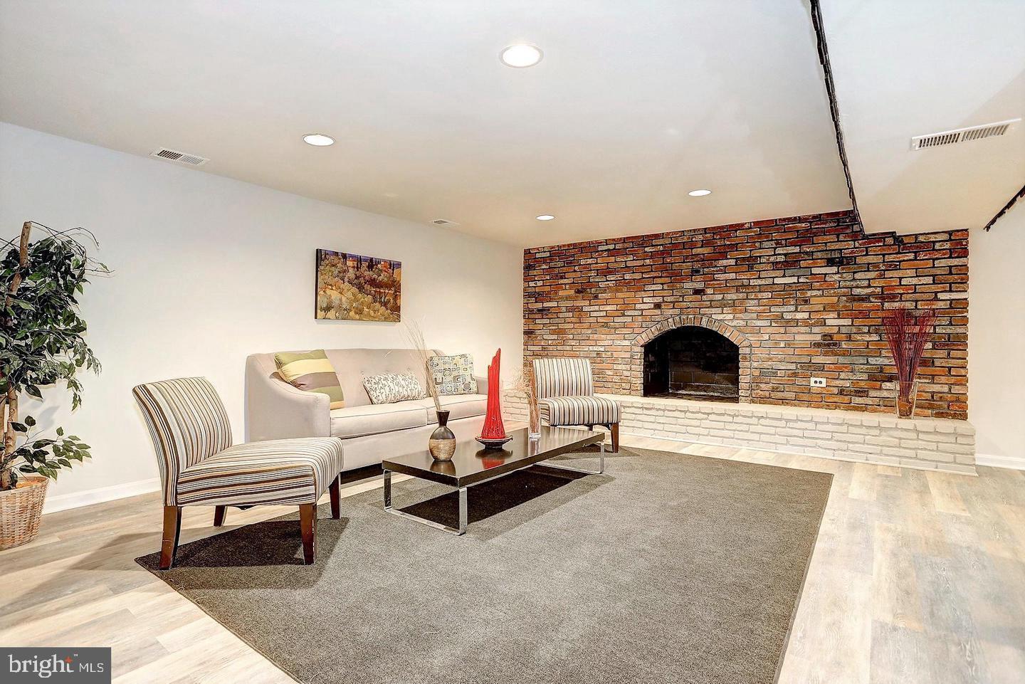 4024 Carthage Road Randallstown, MD 21133 - Photo 14 of 17 Basement Family Room w/ Fireplace
