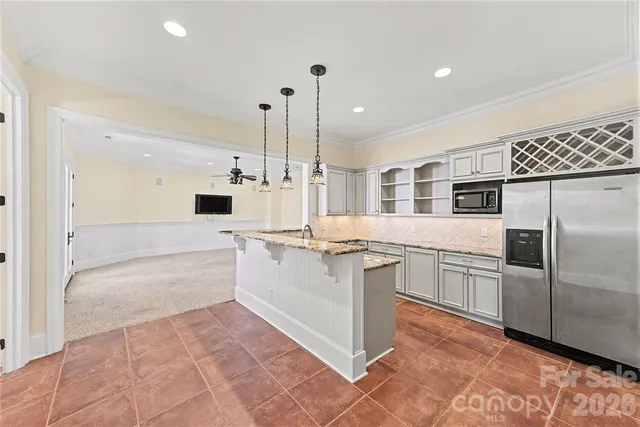 a large kitchen with cabinets