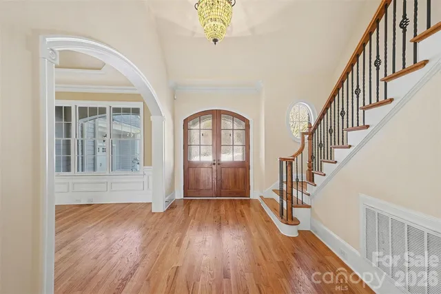 a view of entryway with wooden floor