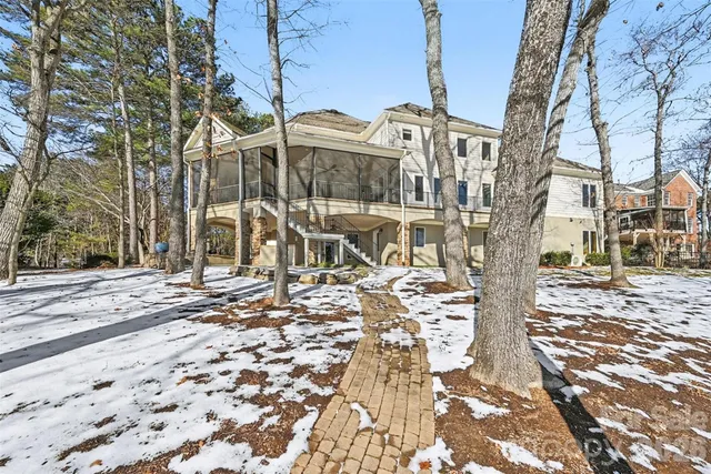 an aerial view of a house with outdoor space