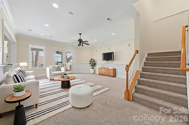 a living room with furniture and a table