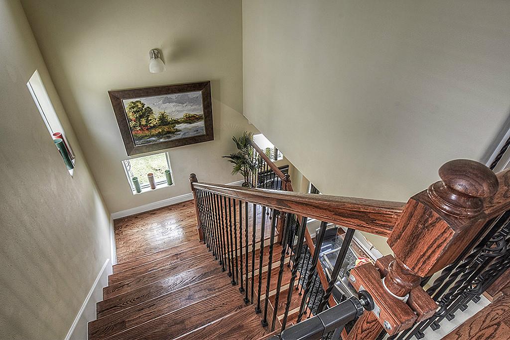 1137 West 24th Street, Unit A Houston, TX 77008 - Photo 1 of 40 a view of staircase with furniture