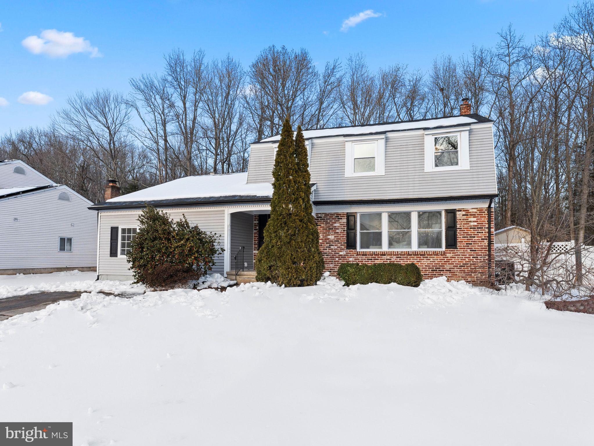 7 Charter Oak Road Clementon, NJ 08021 - Photo 2 of 48 a view of a house with a yard covered in snow