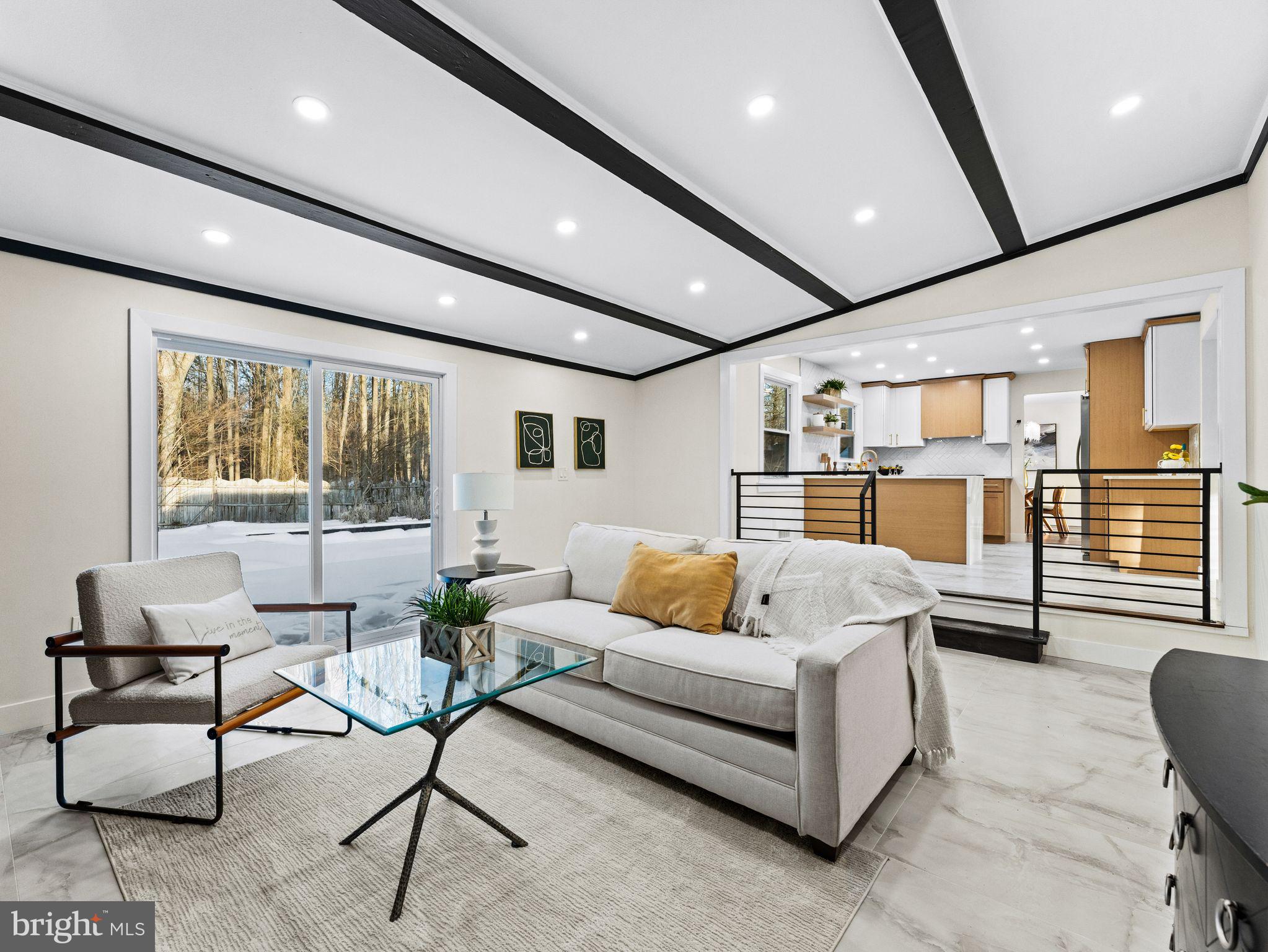 7 Charter Oak Road Clementon, NJ 08021 - Photo 22 of 48 a living room with furniture and a large window