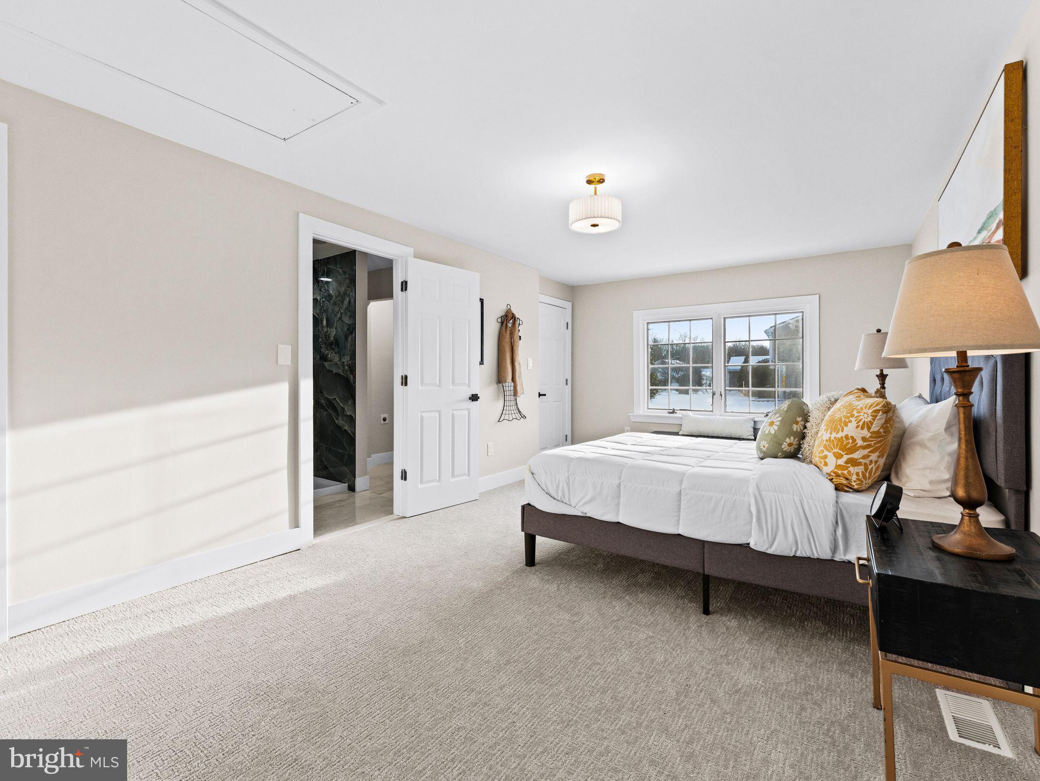 7 Charter Oak Road Clementon, NJ 08021 - Photo 24 of 48 a spacious bedroom with a bed and lamp