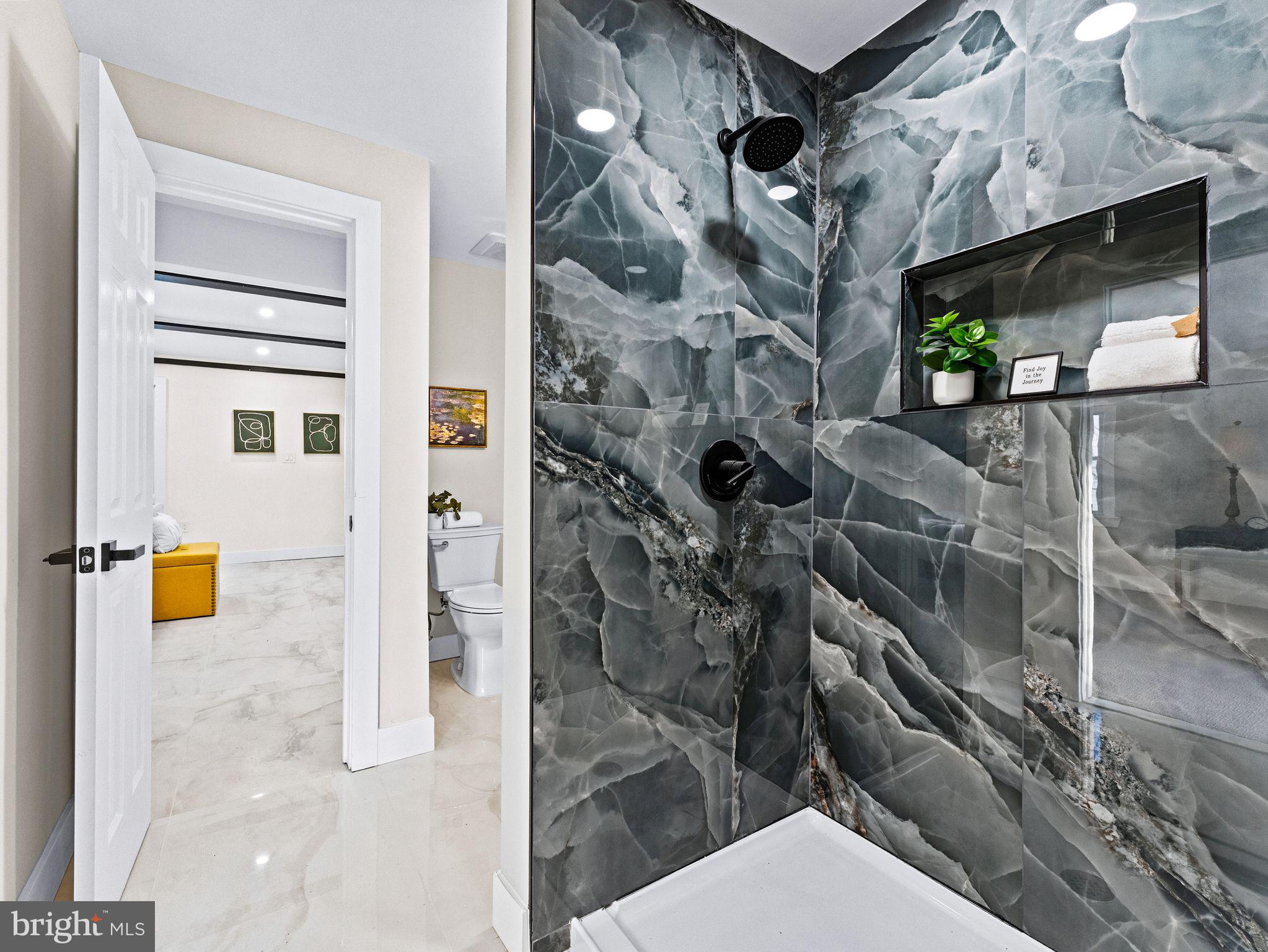 7 Charter Oak Road Clementon, NJ 08021 - Photo 26 of 48 a bathroom with a toilet sink and shower