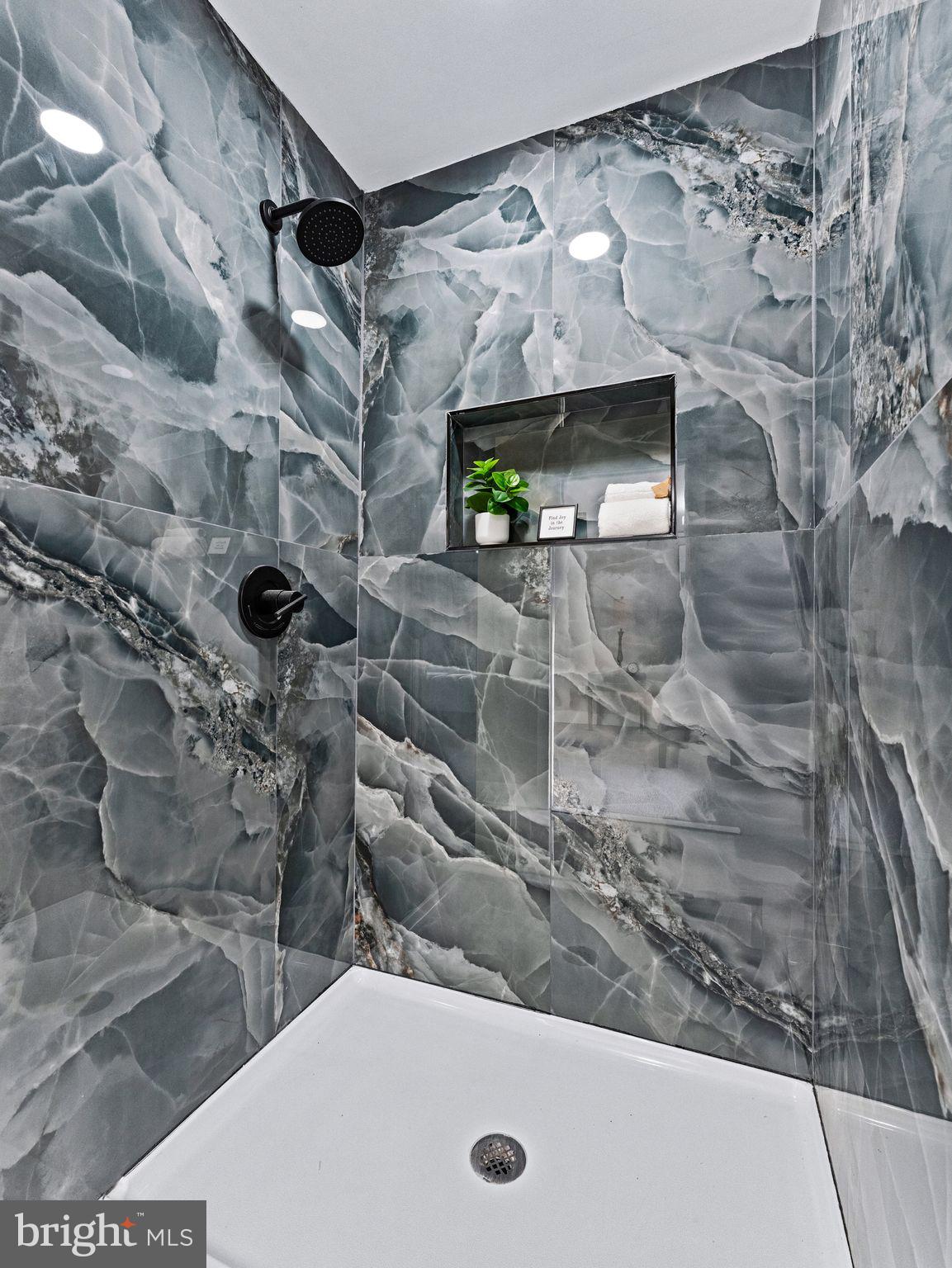 7 Charter Oak Road Clementon, NJ 08021 - Photo 27 of 48 a bathroom with a tub and shower