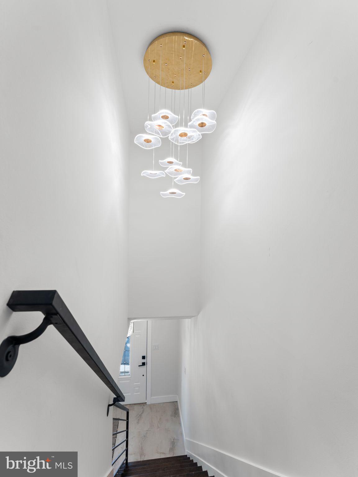 7 Charter Oak Road Clementon, NJ 08021 - Photo 29 of 48 a view of a hallway with a chandelier