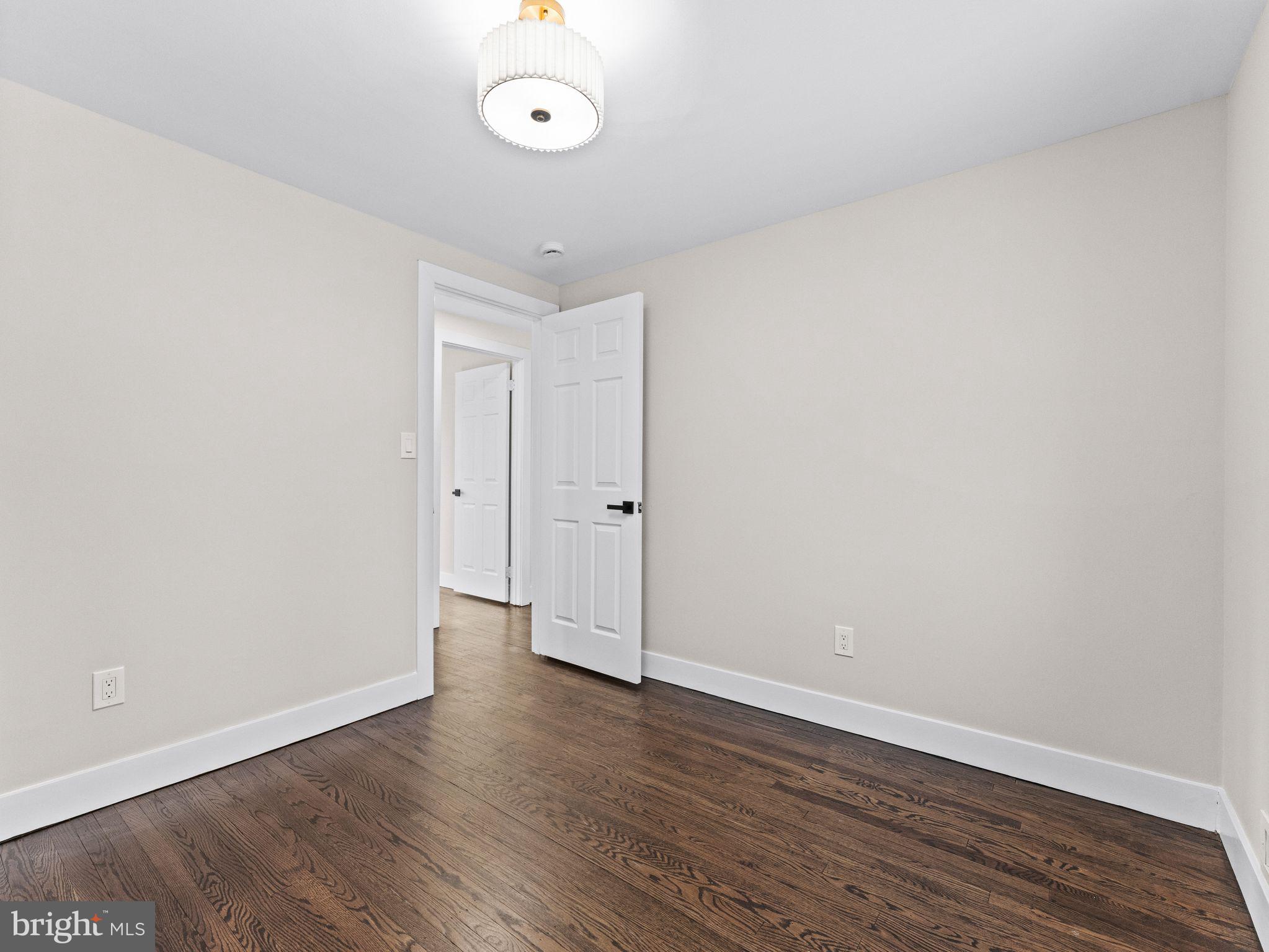 7 Charter Oak Road Clementon, NJ 08021 - Photo 34 of 48 a view of an empty room with wooden floor