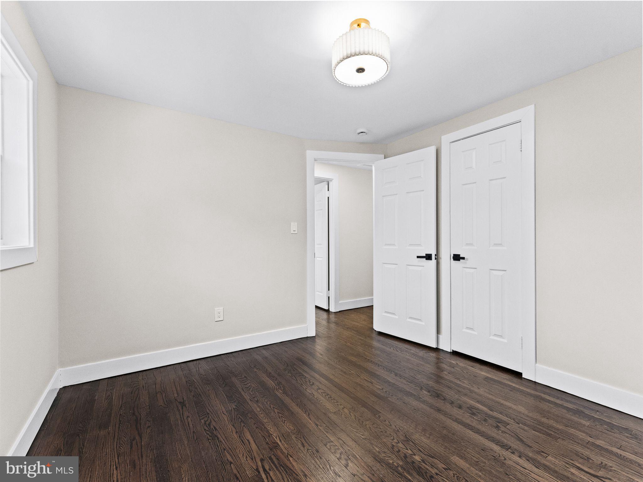 7 Charter Oak Road Clementon, NJ 08021 - Photo 41 of 48 a view of an empty room with wooden floor