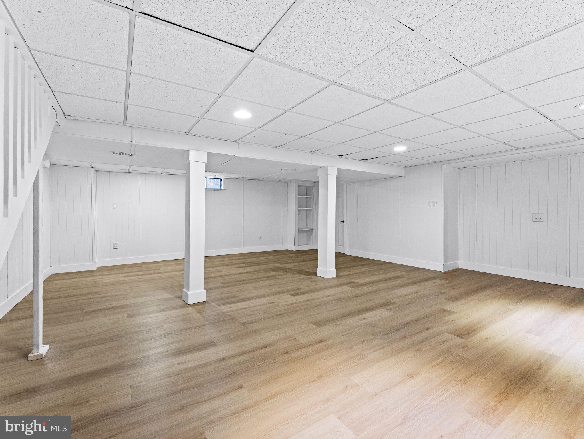 7 Charter Oak Road Clementon, NJ 08021 - Photo 42 of 48 a view of empty room with wooden floor