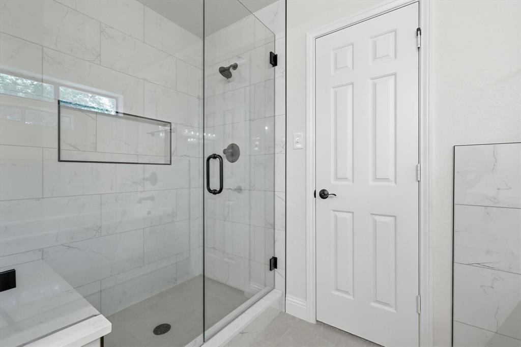19 Timbergreen Circle Denton, TX 76205 - Photo 23 of 40 a bathroom with a shower