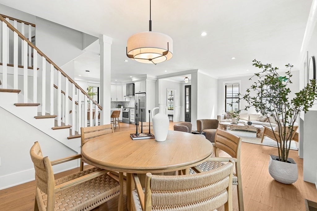 65 Summer Street, Unit 1 Natick, MA 01760 - Photo 9 of 21 a dining room with furniture and wooden floor