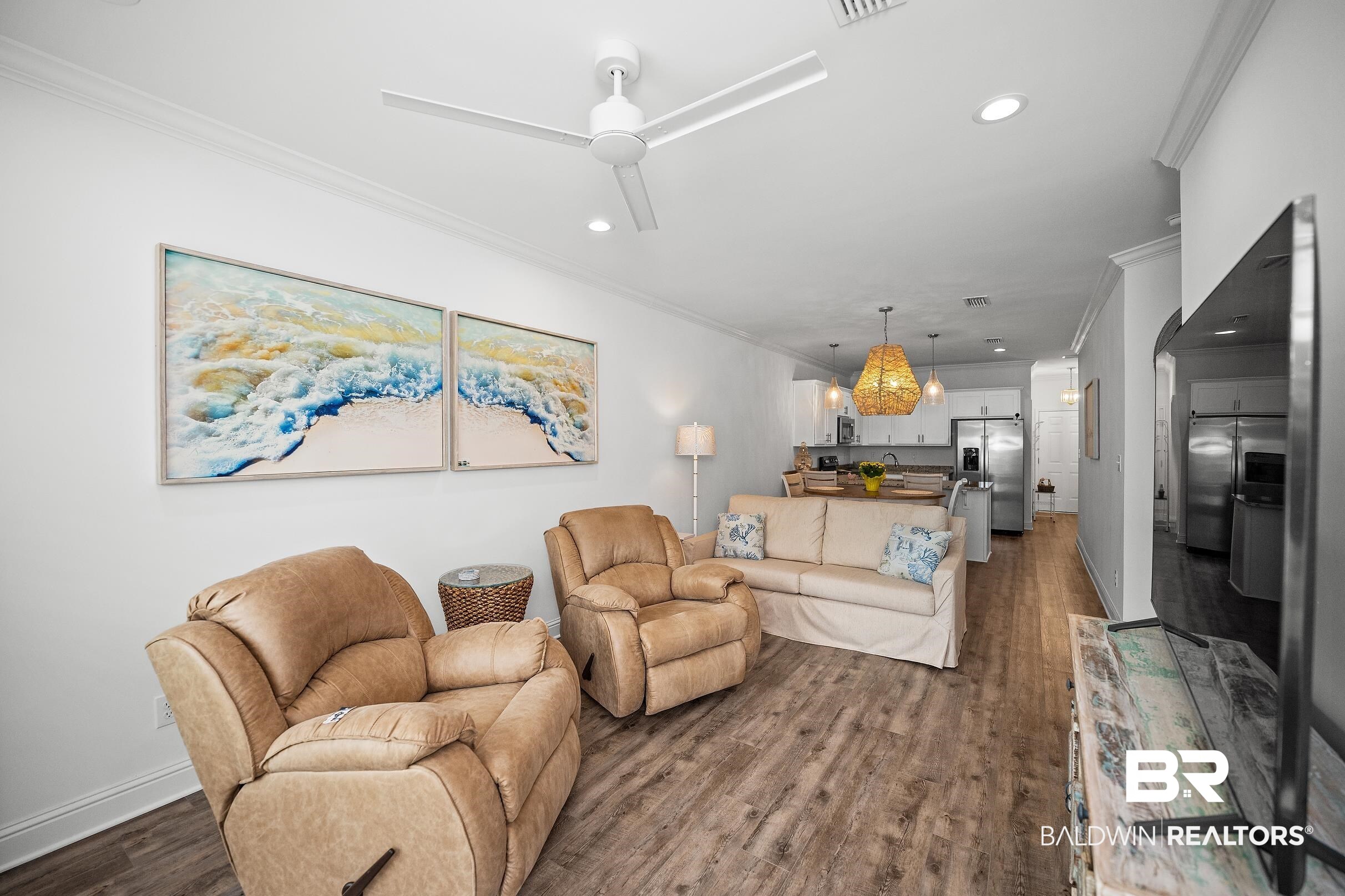 2651 South Juniper Street, Unit 2002 Foley, AL 36535 - Photo 7 of 23 Open-concept living space featuring wood-finish flooring, recessed lighting, and crown molding