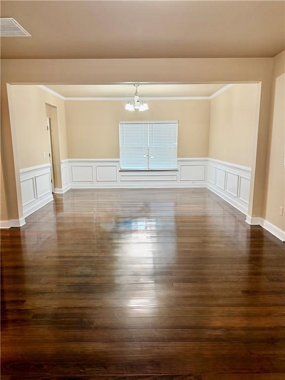 1985 Boatswain Drive Hampton, GA 30228 - Photo 3 of 14 a view of a room with wooden floor and white walls