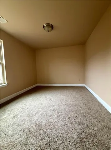 an empty room with a workbench