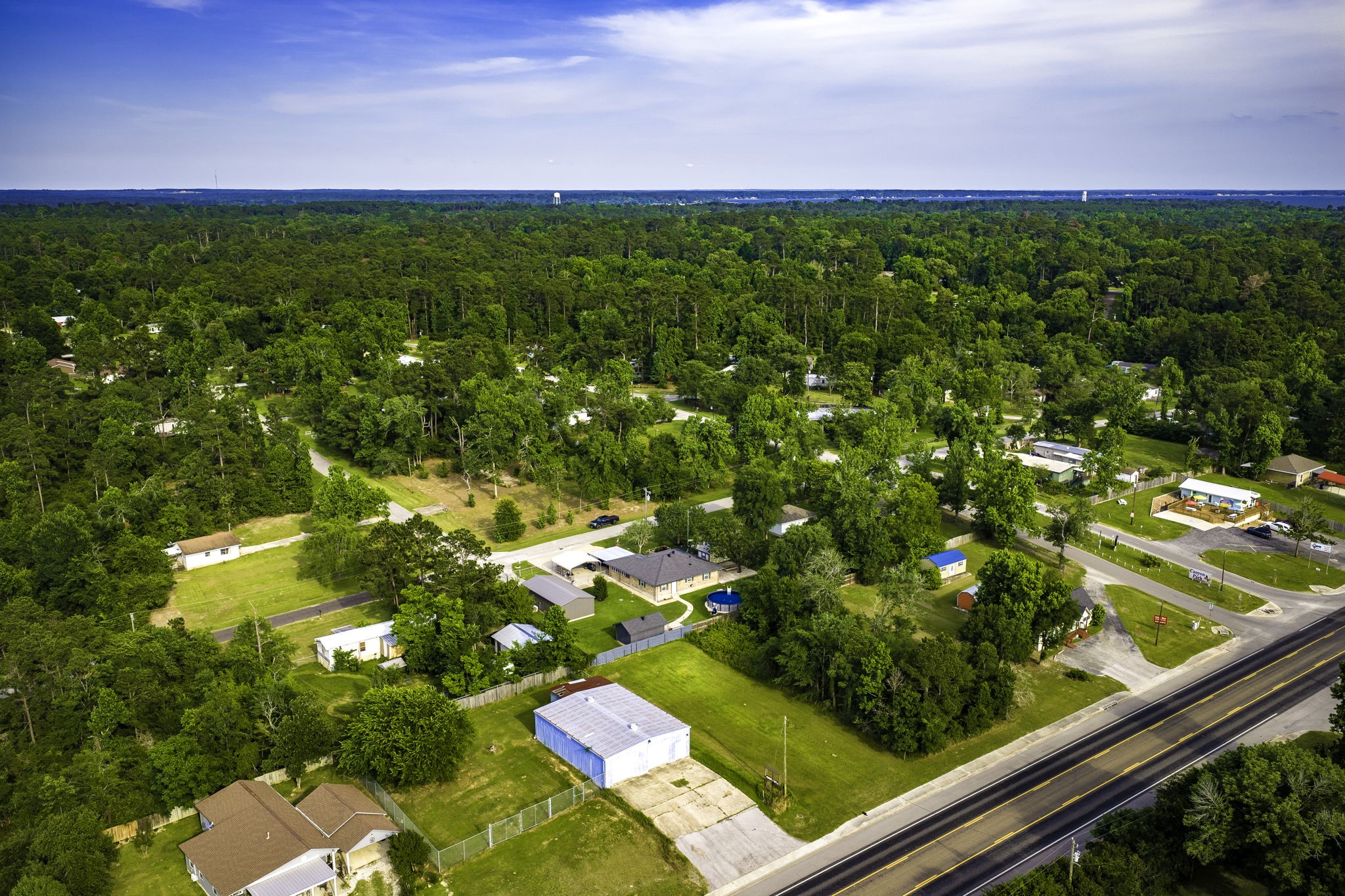 188 Huckleberry Road Onalaska, TX 77360 - Photo 45 of 49 a view of a yard from a balcony