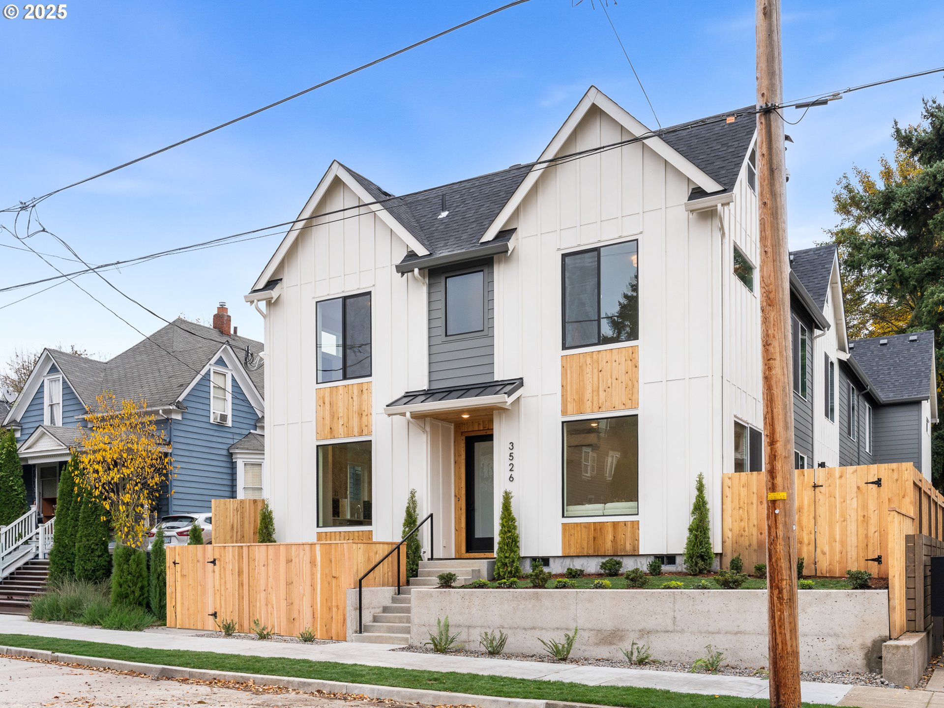 3554 North Haight Avenue, Unit 3 Portland, OR 97227 - Photo 1 of 20 a front view of a residential houses with yard