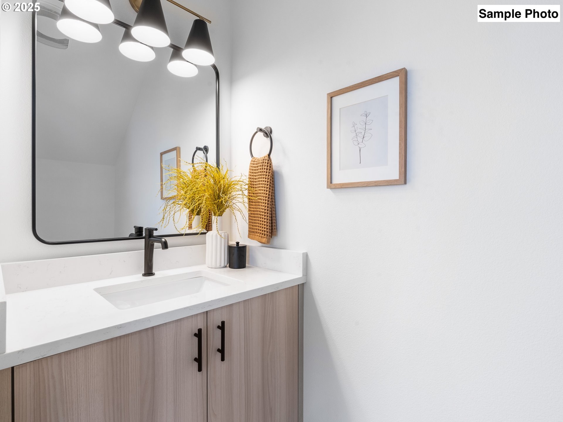 3554 North Haight Avenue, Unit 3 Portland, OR 97227 - Photo 13 of 20 a bathroom with a sink and a mirror