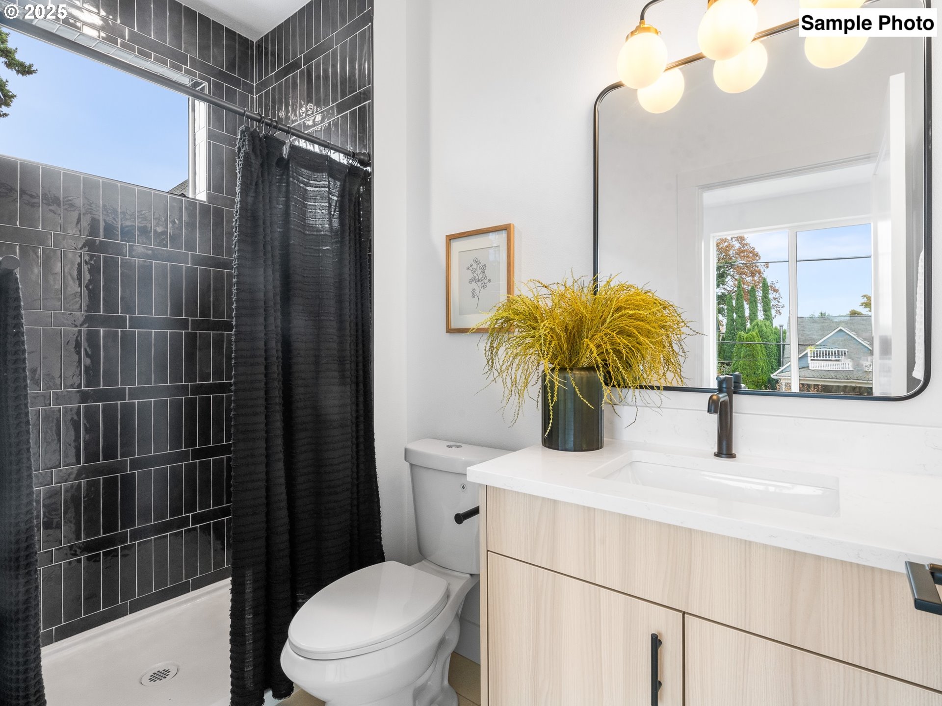 3554 North Haight Avenue, Unit 3 Portland, OR 97227 - Photo 14 of 20 a bathroom with a sink toilet and shower