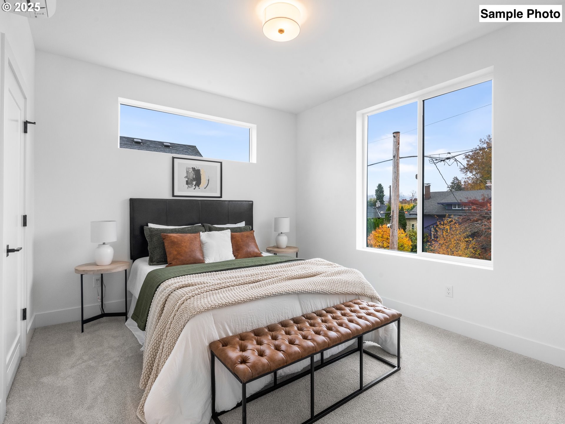 3554 North Haight Avenue, Unit 3 Portland, OR 97227 - Photo 16 of 20 a bedroom with a bed and a window