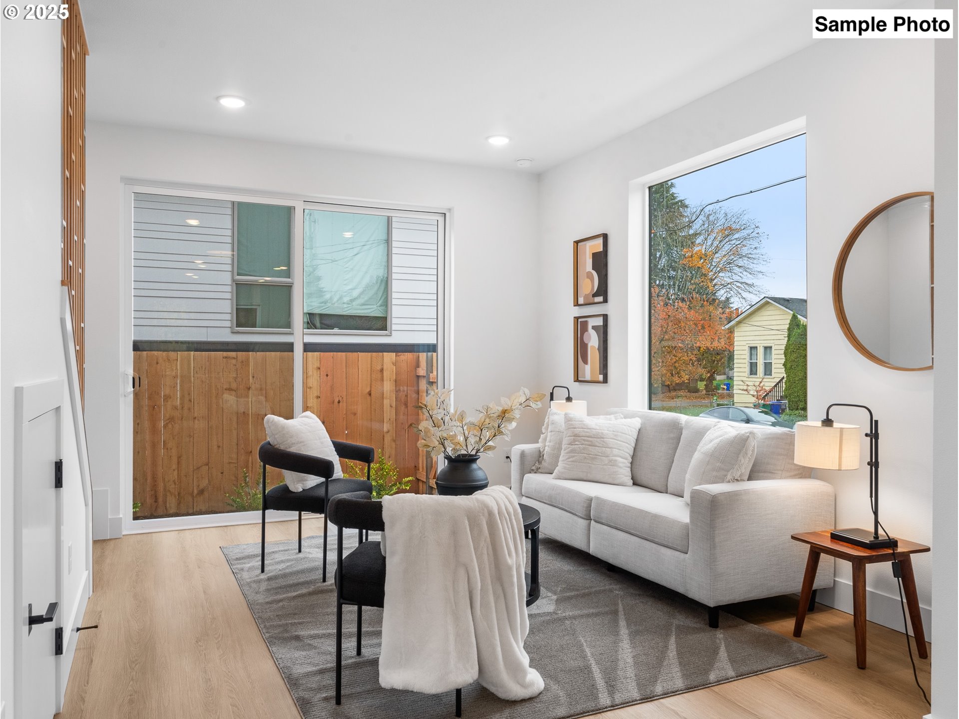 3554 North Haight Avenue, Unit 3 Portland, OR 97227 - Photo 3 of 20 a living room with furniture and a large window