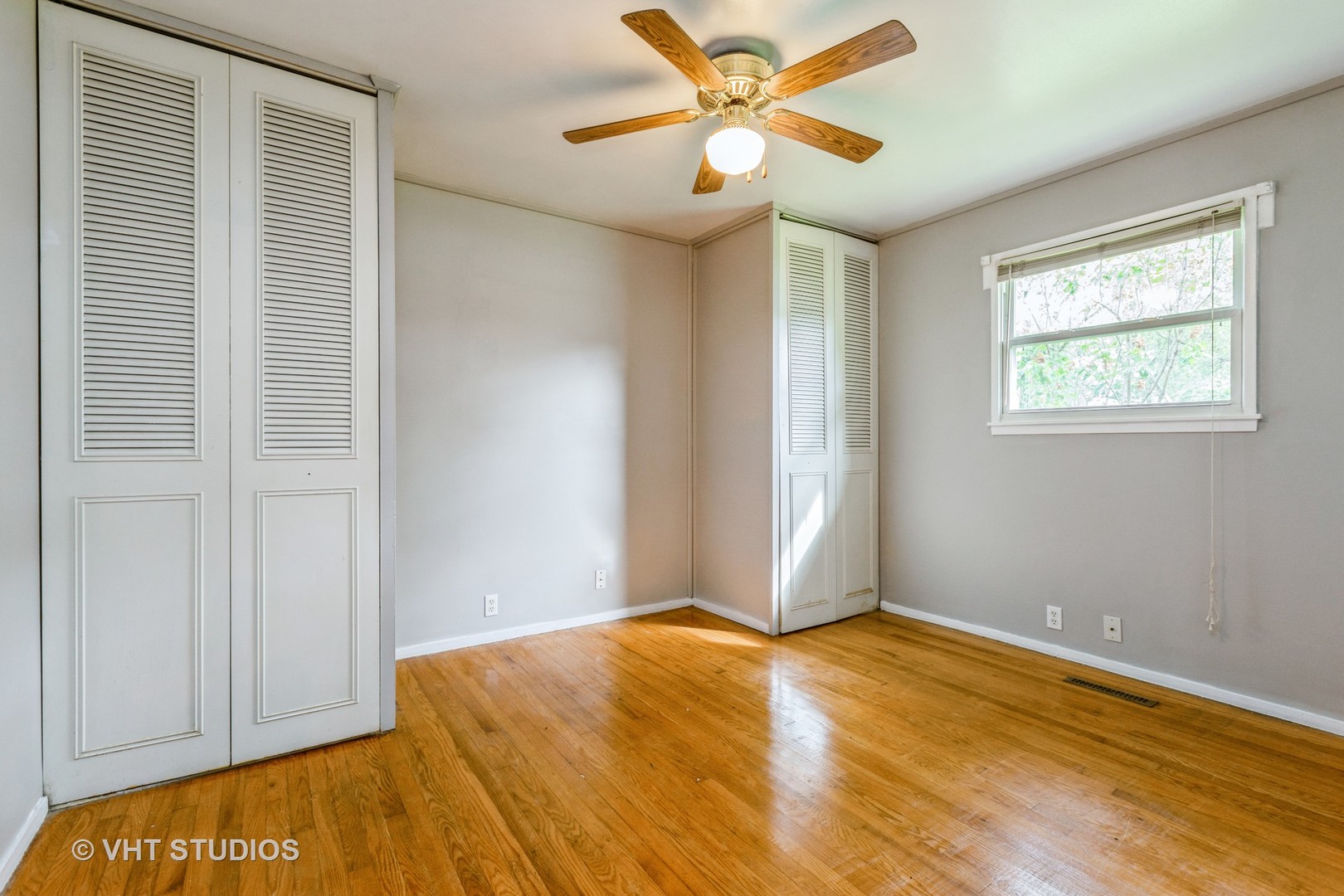 34 A Robin Road Carpentersville, IL 60110 - Photo 6 of 10 a view of a big room with wooden floor and closet area