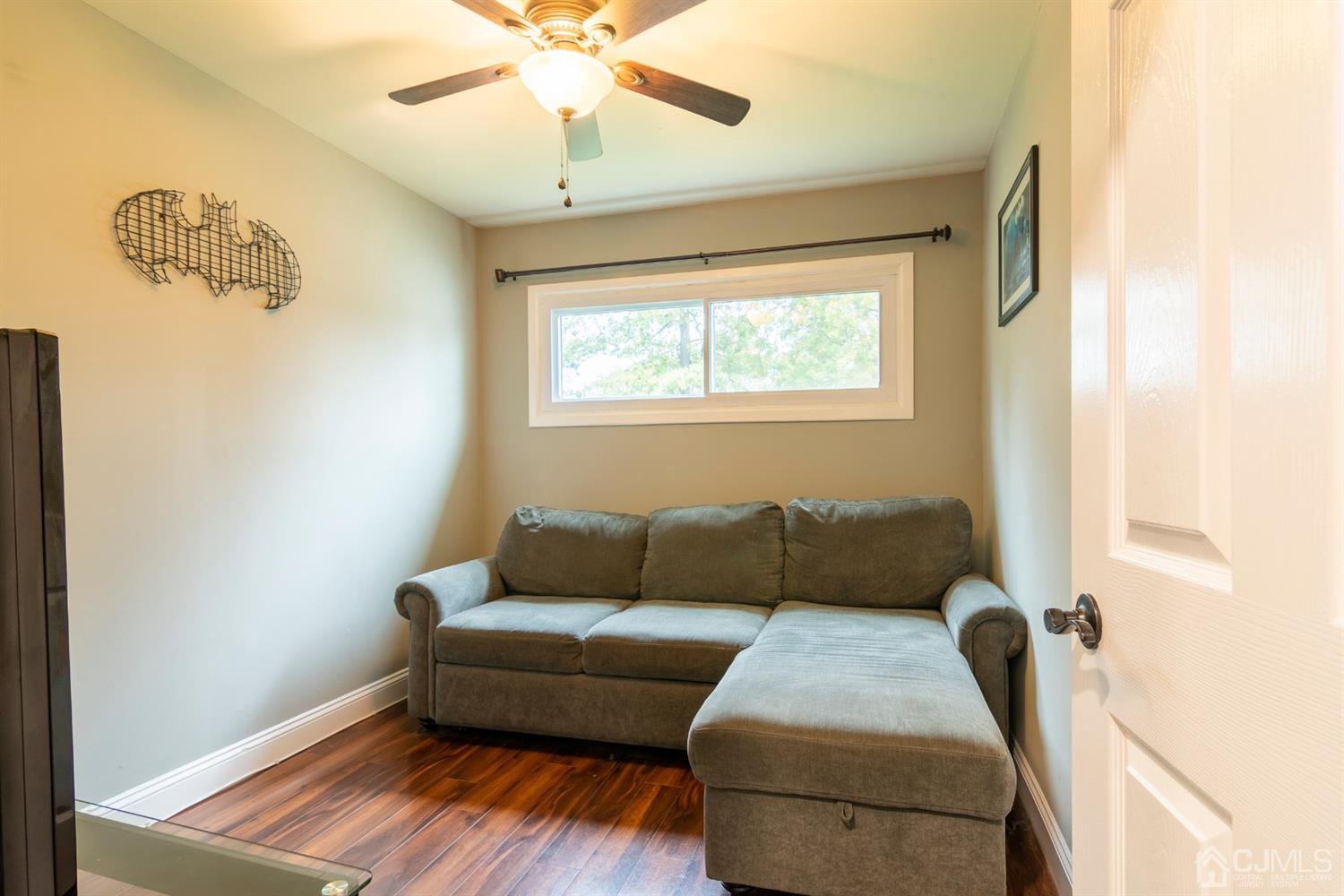 154 Winthrop Road Edison, NJ 08817 - Photo 12 of 18 a living room with furniture and a window
