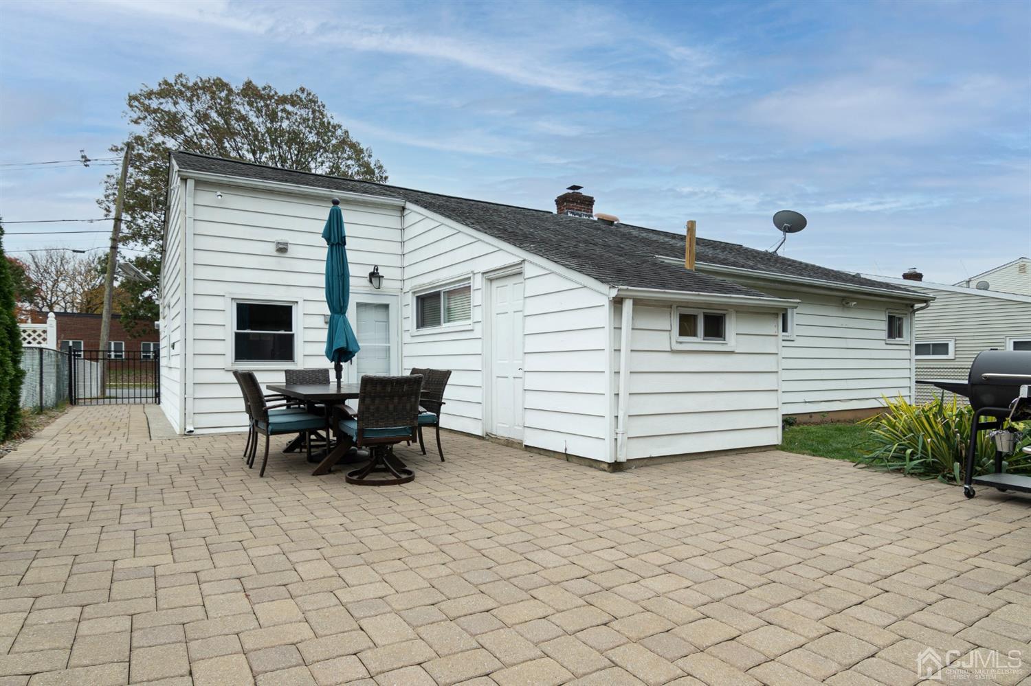 154 Winthrop Road Edison, NJ 08817 - Photo 15 of 18 a view of a terrace with sitting area