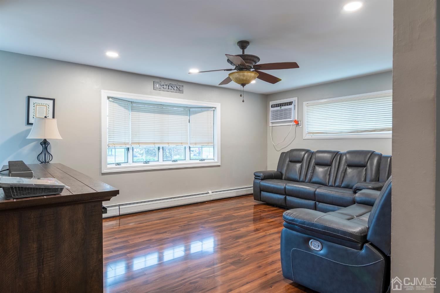154 Winthrop Road Edison, NJ 08817 - Photo 5 of 18 a living room with furniture and a window