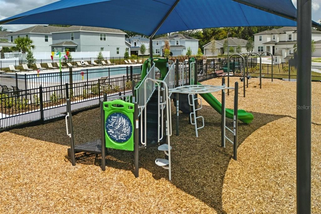 1256 White Ash Loop DeLand, FL 32720 - Photo 2 of 4 a view of a swimming pool with a patio