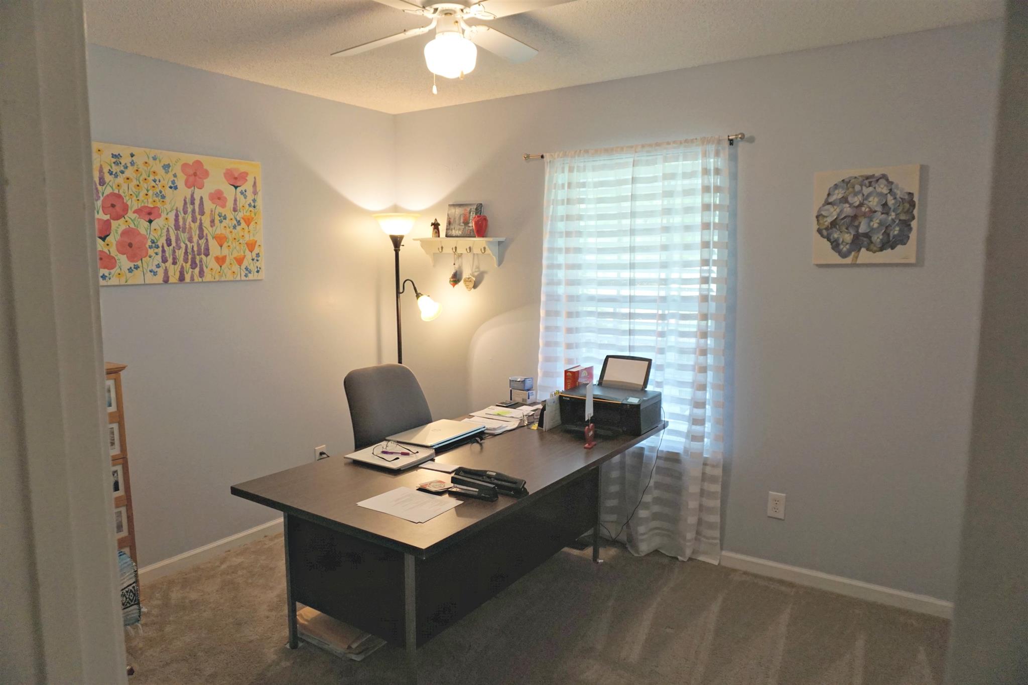 106 Walter Bartlett Road Manchester, TN 37355 - Photo 20 of 26 a view of a workspace with furniture and a window